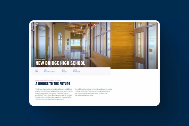 New Bridge High School interior showcasing modern design elements, natural light, and sustainable materials, reflecting innovative educational spaces and community engagement.